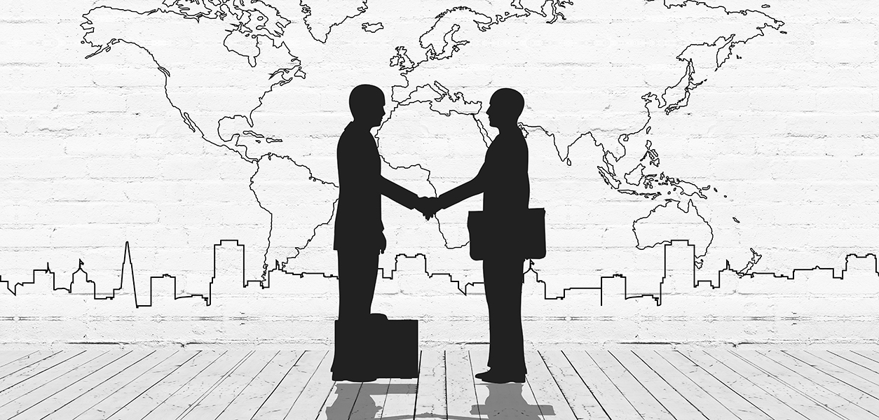 Two business man shake hand silhouettes city